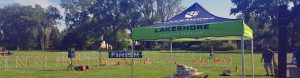 Lakeshore Athletic Services tent set up outside.
