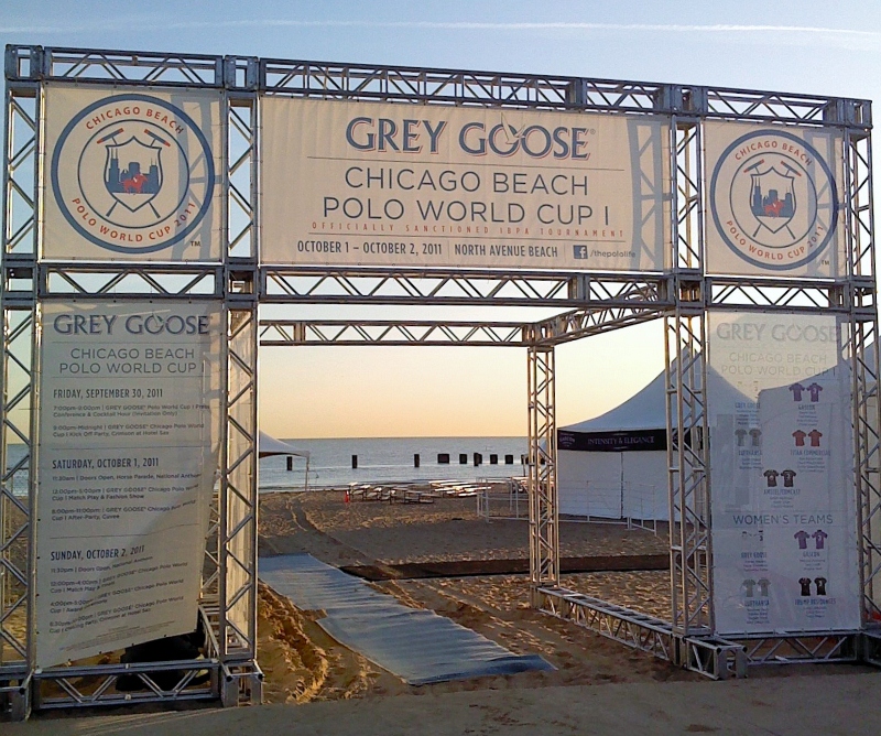 Chicago Beach Polo World Cup structure set up outside on the beach with ocean in background.