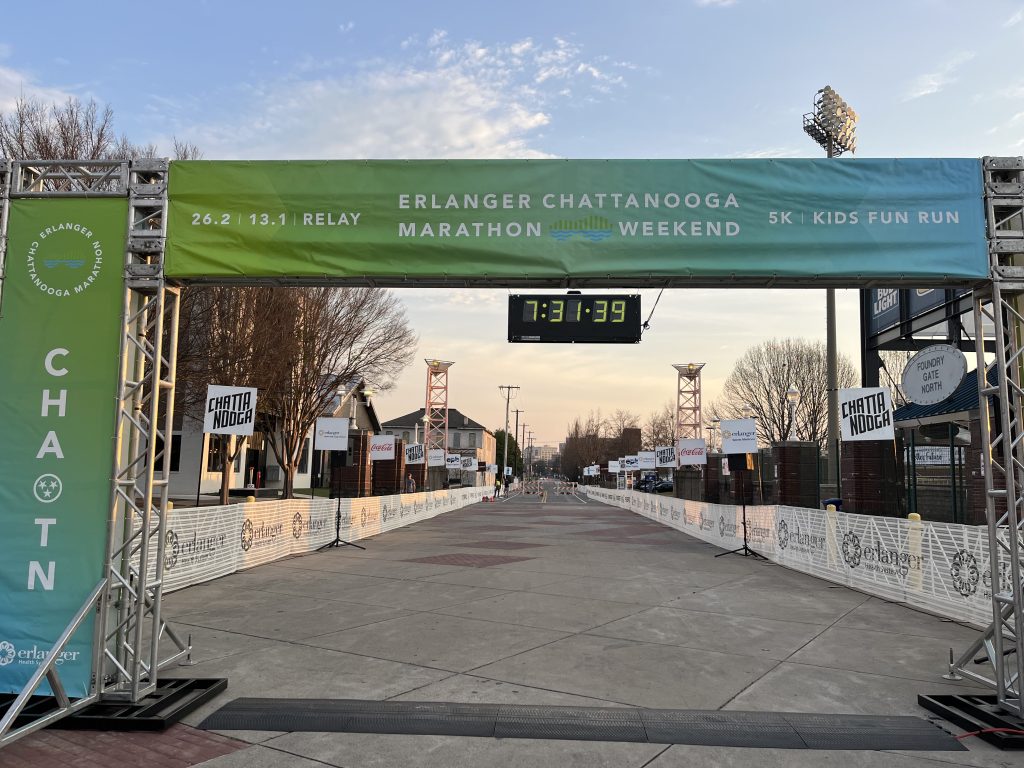 Finish line set up outside with a digital clock attached.