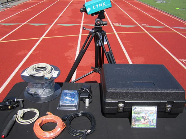 Lynx equipment on a table set up on an outdoor track.