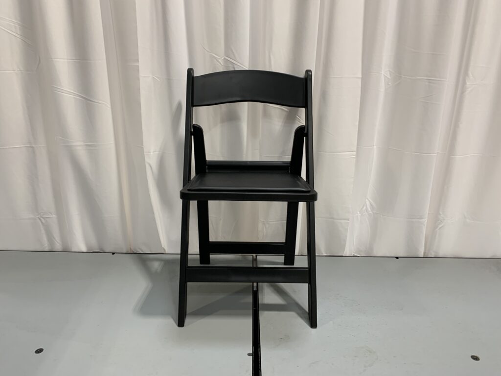 Black padded chair displayed.