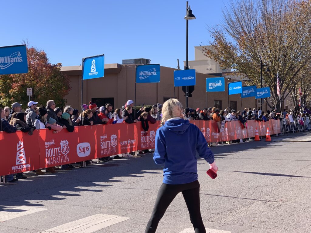 L-Poles set up outside at finish line with many spectators watching.