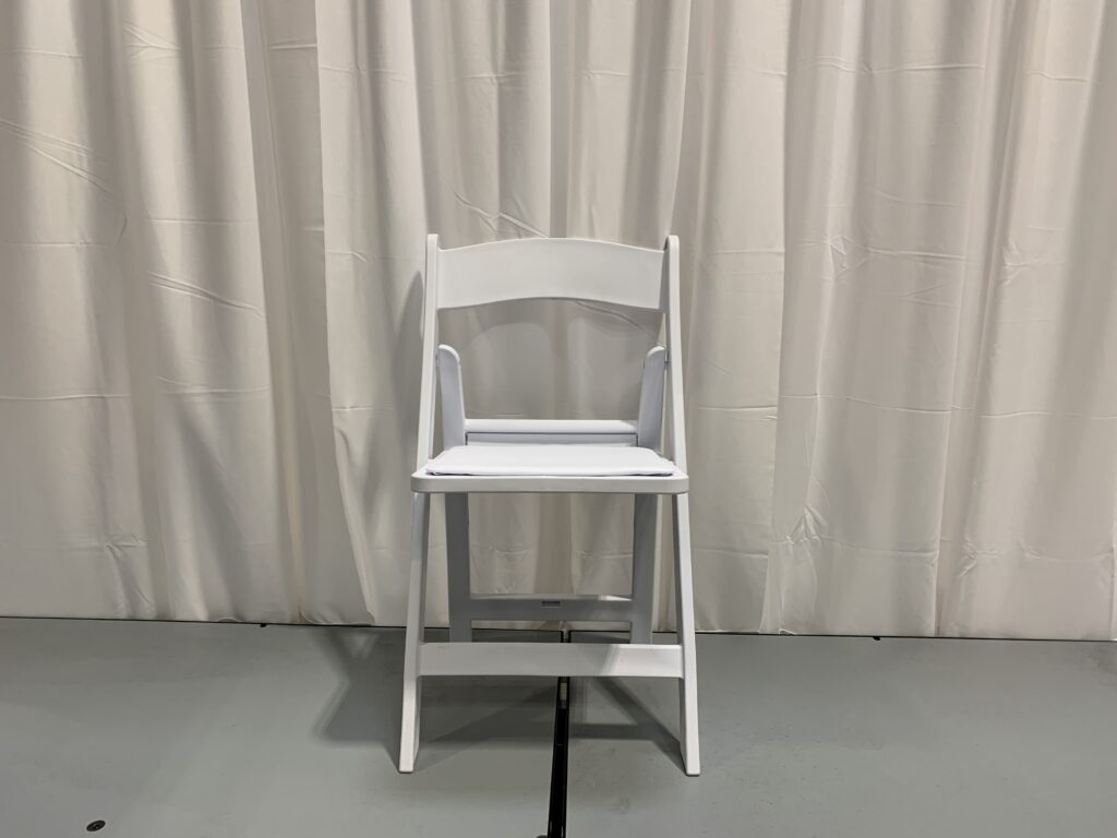 White padded chair displayed.